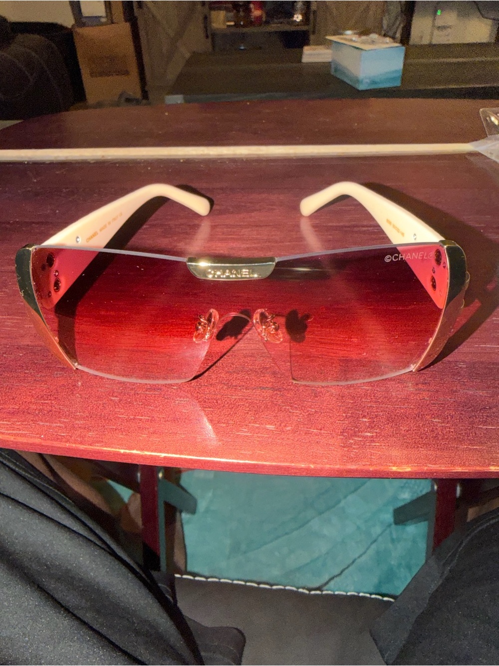 CHANEL Rimless Sunglasses with Pink-Red Gradient Lenses and Cream Arms